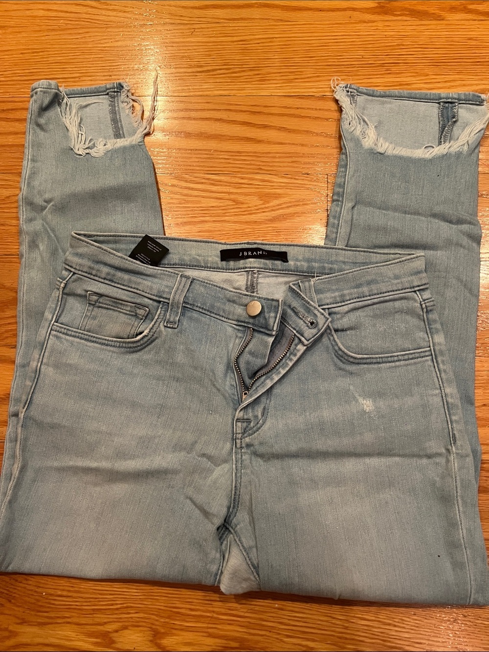 J Brand Light Wash Cropped Skinny Jeans with Frayed Ankles